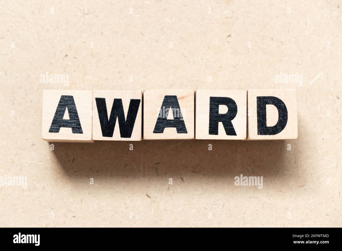 Alphabet letter block in word award on wood background Stock Photo