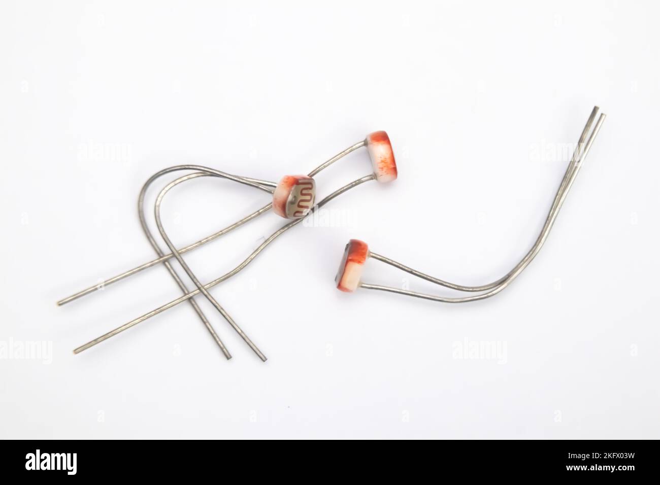 Top view of three LDR (Light Dependent Resistor) on white background