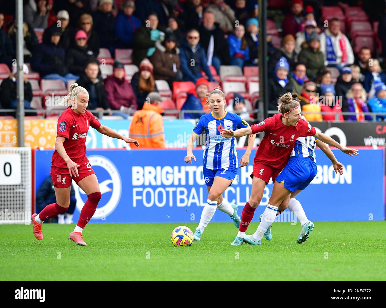 Crawley, UK. 20th Nov, 2022. Yana Daniels of Liverpool is played off the ball by Veatriki Sarri of Brighton and Hove Albion and Julia Zigiotti Olme of Brighton and Hove Albion during the FA Women's Super League match between Brighton & Hove Albion Women and Liverpool Women at The People's Pension Stadium on November 20th 2022 in Crawley, United Kingdom. (Photo by Jeff Mood/phcimages.com) Credit: PHC Images/Alamy Live News Stock Photo