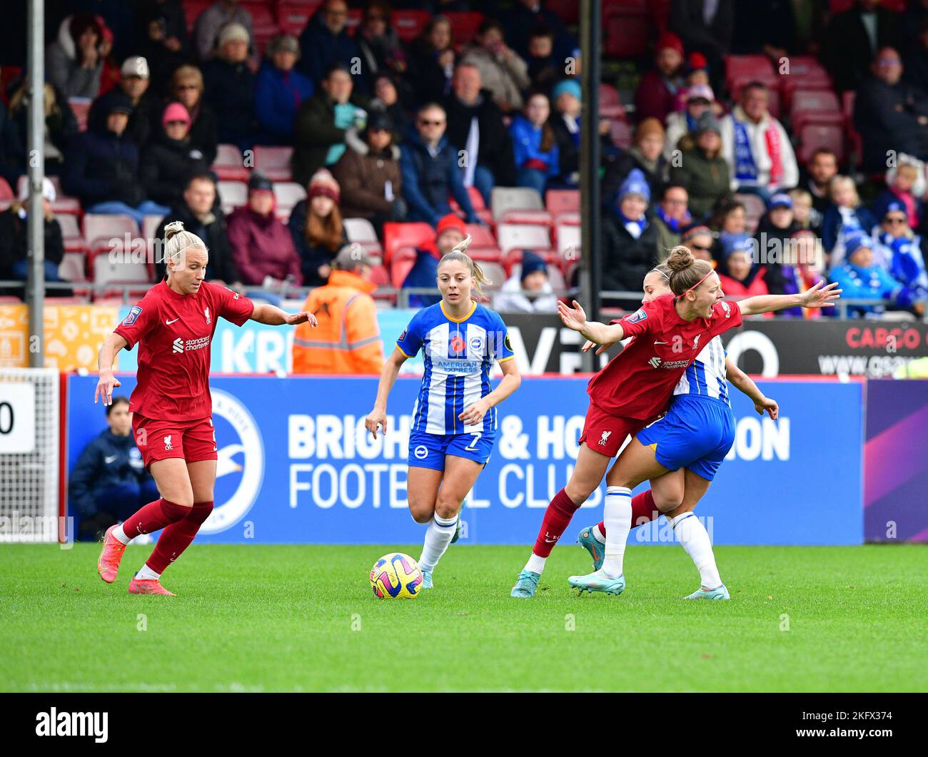 Crawley, UK. 20th Nov, 2022. Yana Daniels of Liverpool is played off the ball by Veatriki Sarri of Brighton and Hove Albion and Julia Zigiotti Olme of Brighton and Hove Albion during the FA Women's Super League match between Brighton & Hove Albion Women and Liverpool Women at The People's Pension Stadium on November 20th 2022 in Crawley, United Kingdom. (Photo by Jeff Mood/phcimages.com) Credit: PHC Images/Alamy Live News Stock Photo