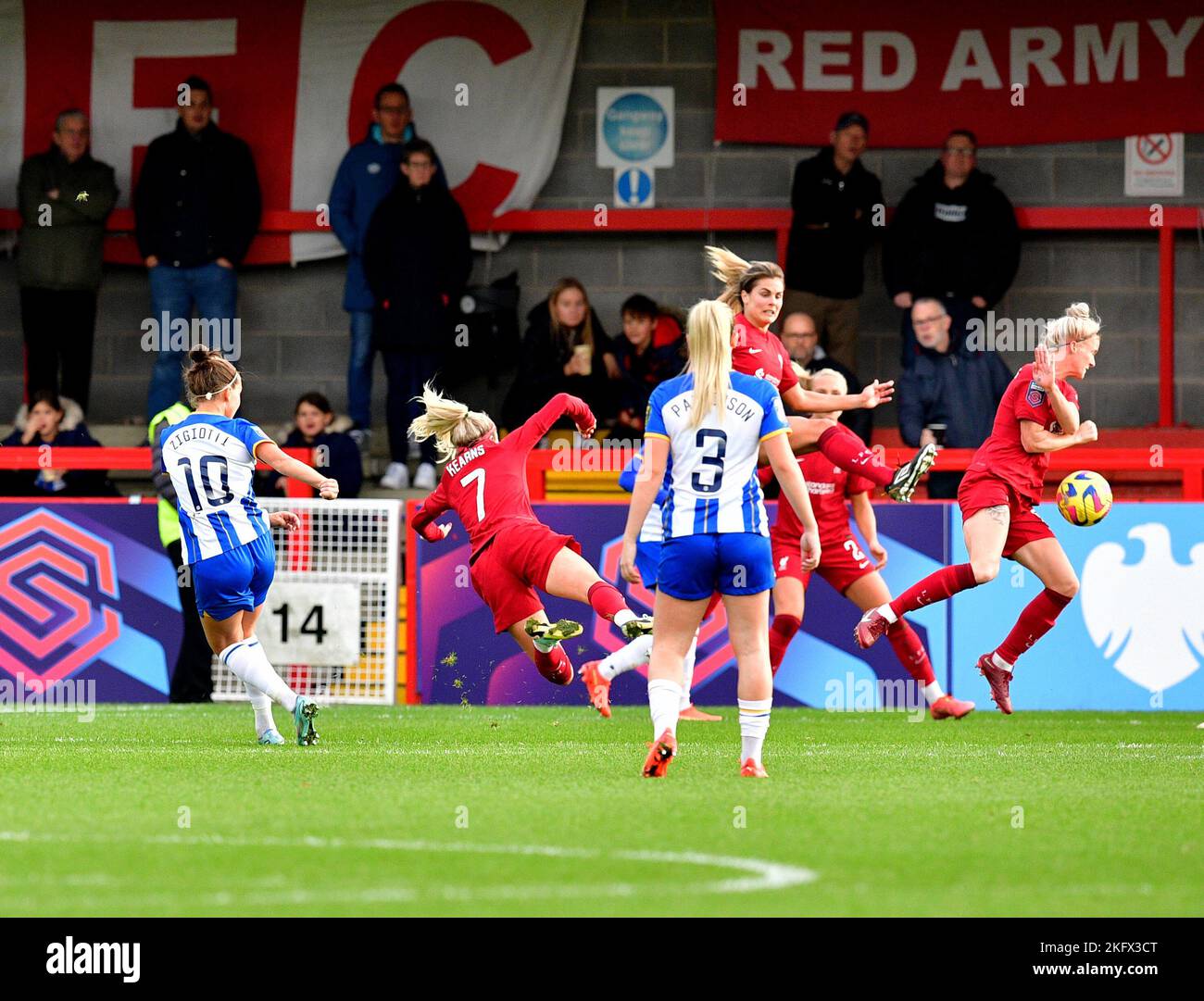 Crawley, UK. 20th Nov, 2022. Missy Bo Kearns of Liverpool tries to stop the shot on goal by Julia Zigiotti Olme of Brighton and Hove Albion during the FA Women's Super League match between Brighton & Hove Albion Women and Liverpool Women at The People's Pension Stadium on November 20th 2022 in Crawley, United Kingdom. (Photo by Jeff Mood/phcimages.com) Credit: PHC Images/Alamy Live News Stock Photo