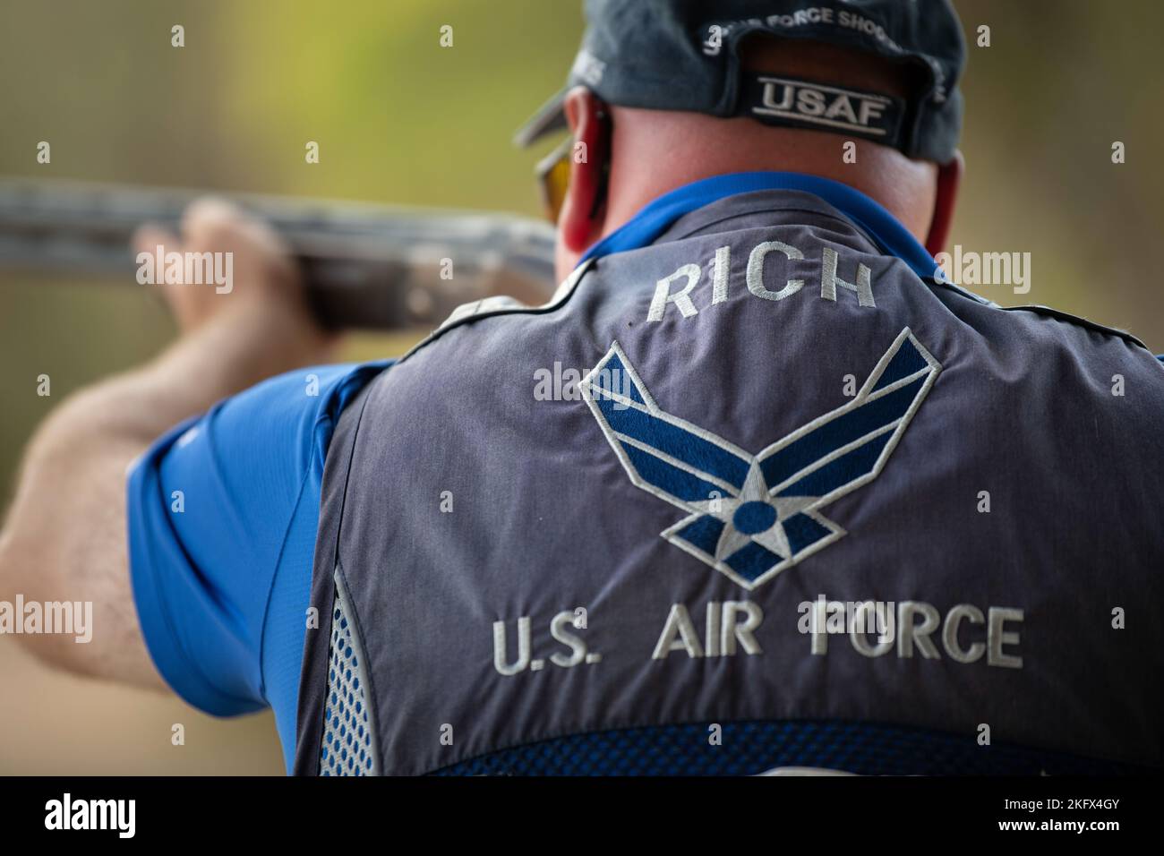 U.S. Air Force Major Daniel Rich, Air Force Services Center, aims his rifle during trapshooting practice October 12, 2022, at the San Antonio Gun Club, Texas. Rich is a member of the Air Force World Class Athlete Program that’s designed to allow elite athletes the opportunity to train and compete in national events to make the U.S. Olympic Team. For the time the athletes are in the program, their sole focus is to train and stay ready to compete in the respective sport. Stock Photo
