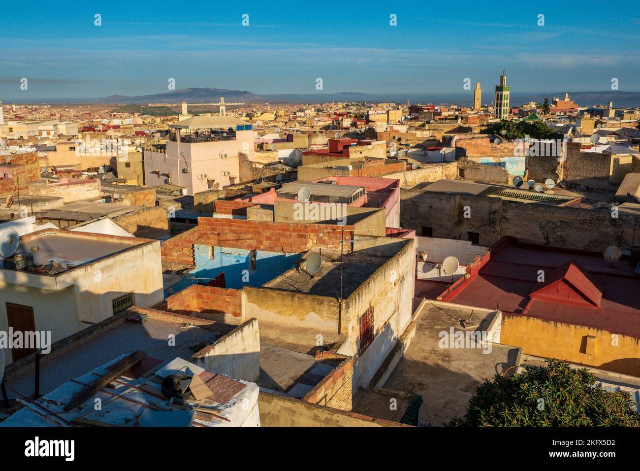 City skyline with mosques and houses of Meknes, Morocco Stock Photo