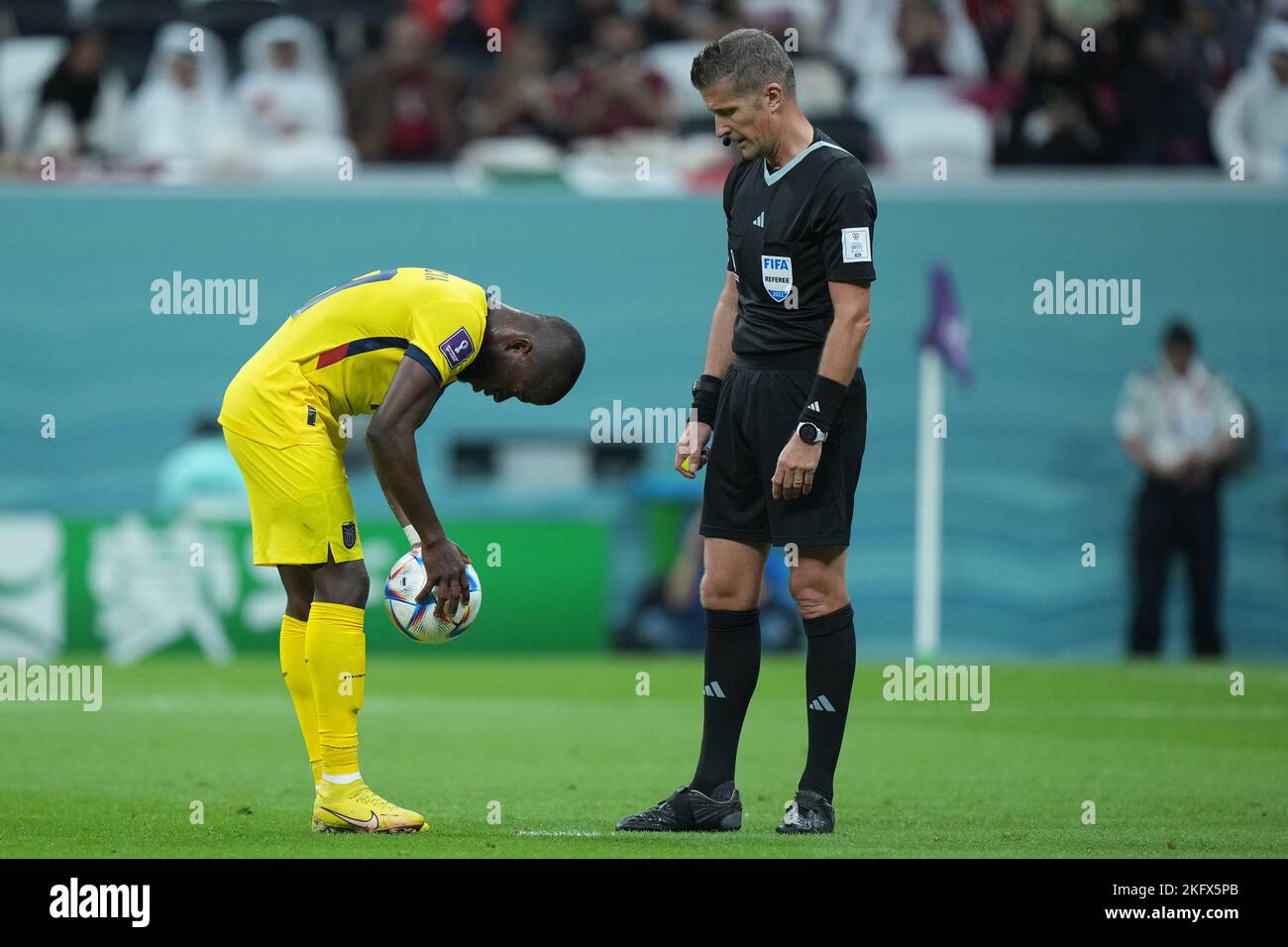 The referee signals a penalty during the Qatar 2022 World Cup match ...