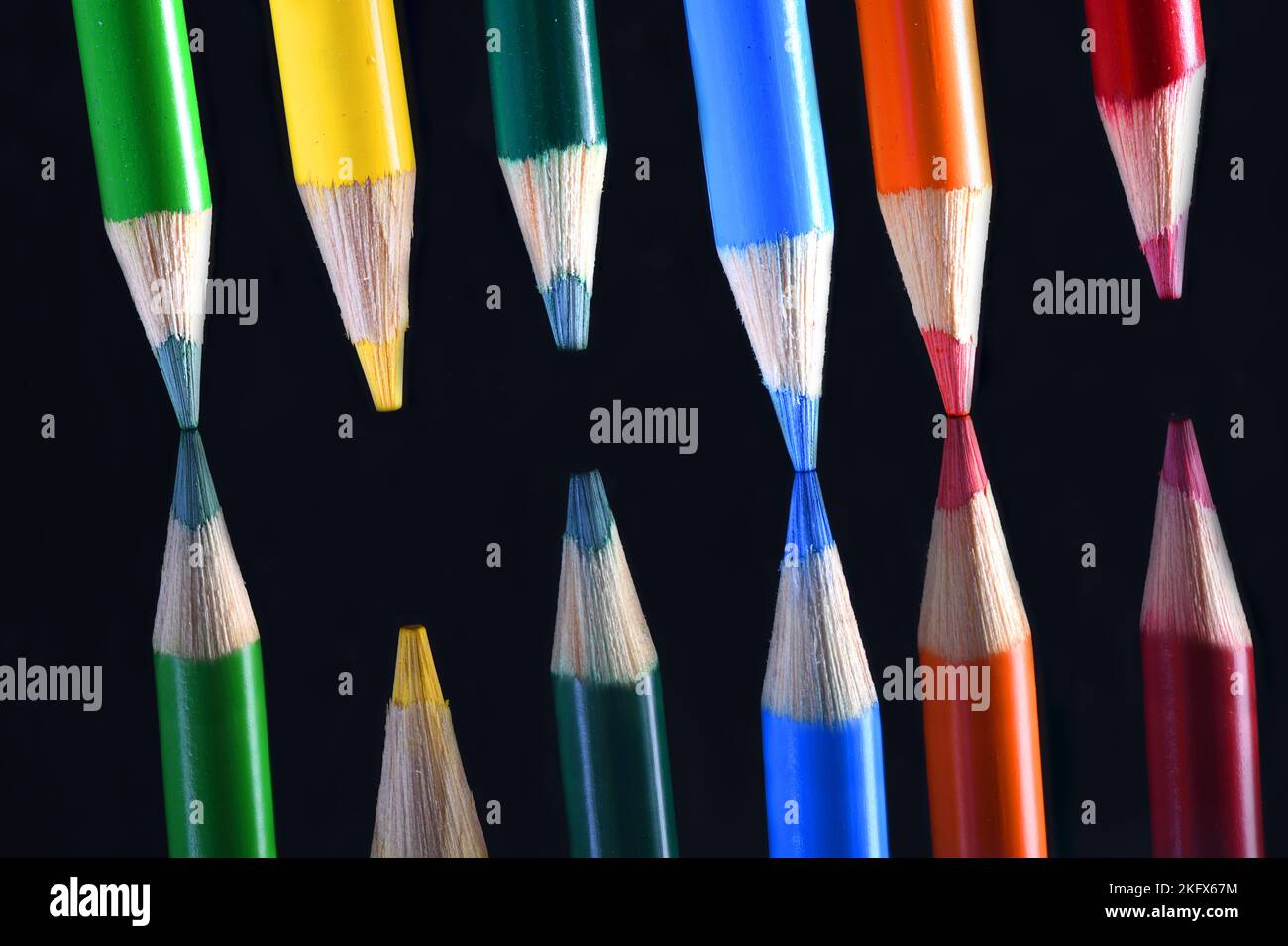 Colored Pencil points on dark glass Stock Photo Alamy