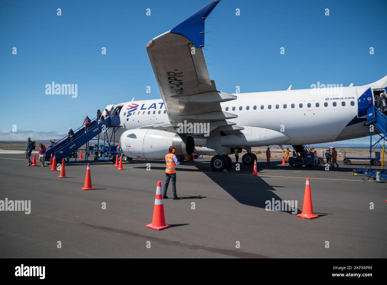 Passengers disembarking from a Latam plane, Seymour Airport, Galapagos Islands Stock Photo