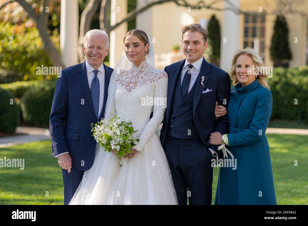 Washington, United States. 19th Nov, 2022. U.S. President Joe Biden and First Lady Jill Biden pose with granddaughter Naomi Biden Neal and her husband Peter Neal during their wedding on the South Lawn of the White House, November 19, 2022, in Washington, DC Credit: Adam Schultz/White House Photo/Alamy Live News Stock Photo