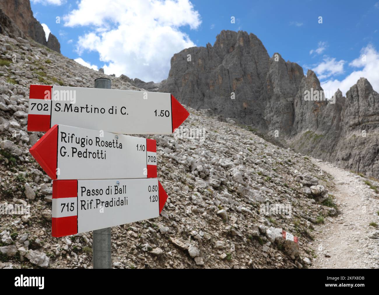 arrows of the paths with the Italian names of the mountain in the Alps in North Italy in summer Stock Photo