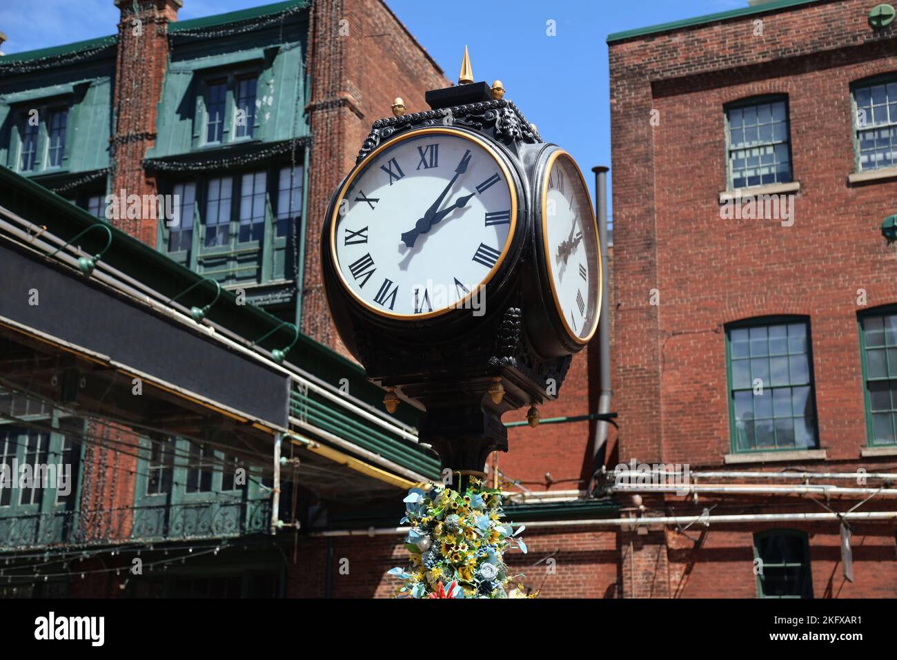 The clock in the Historic Distillery District in Toronto, Canada Stock