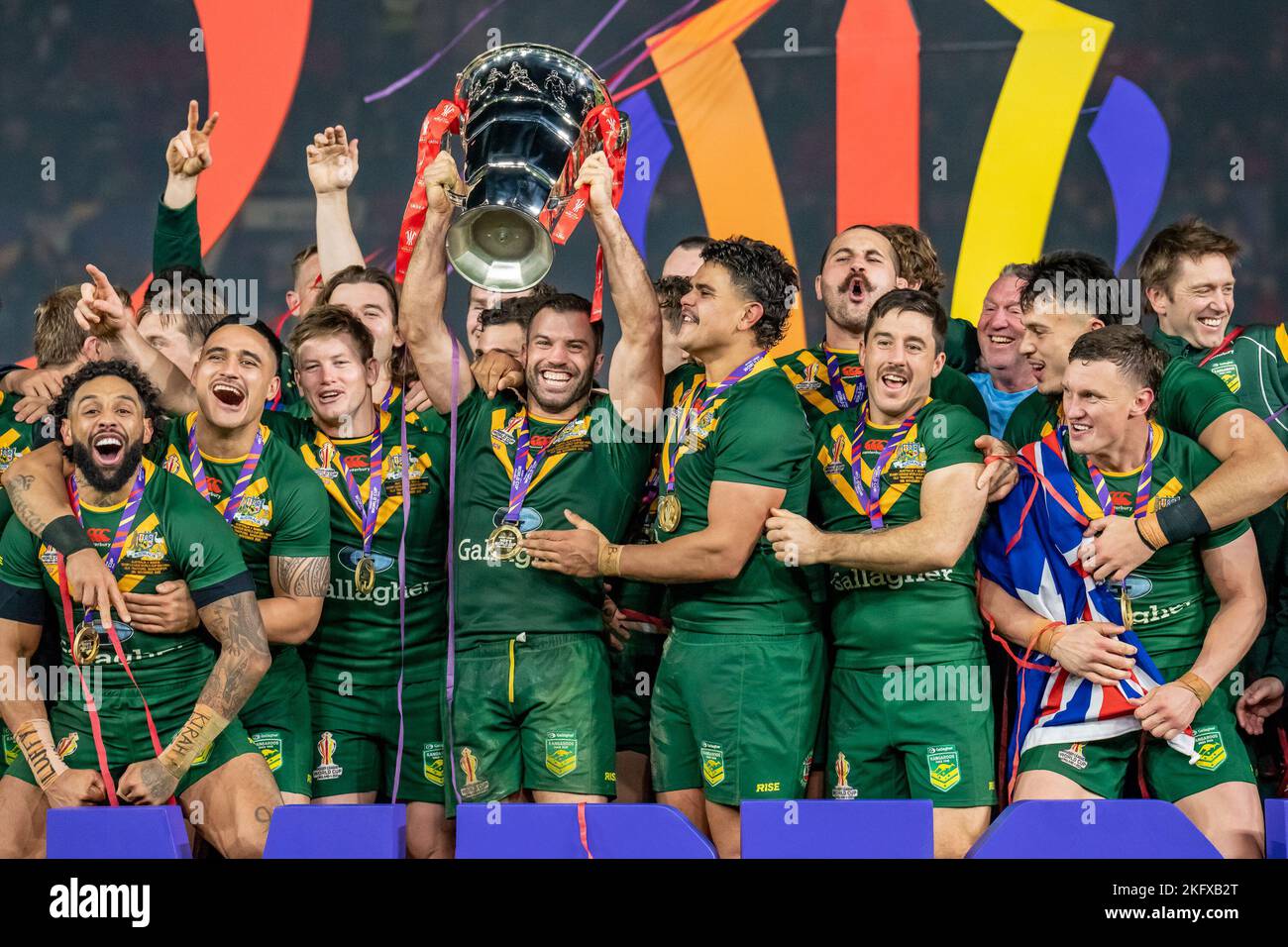 Manchester, UK. 18th Nov, 2022. James Tedesco (C) (Sydney Roosters) of Australia (1) lifts the trophy after winning the 2021 Rugby League World Cup Final 2021 match between Australia and Samoa at Old Trafford, Manchester, England on 19 November 2022. Photo by David Horn. Credit: PRiME Media Images/Alamy Live News Stock Photo