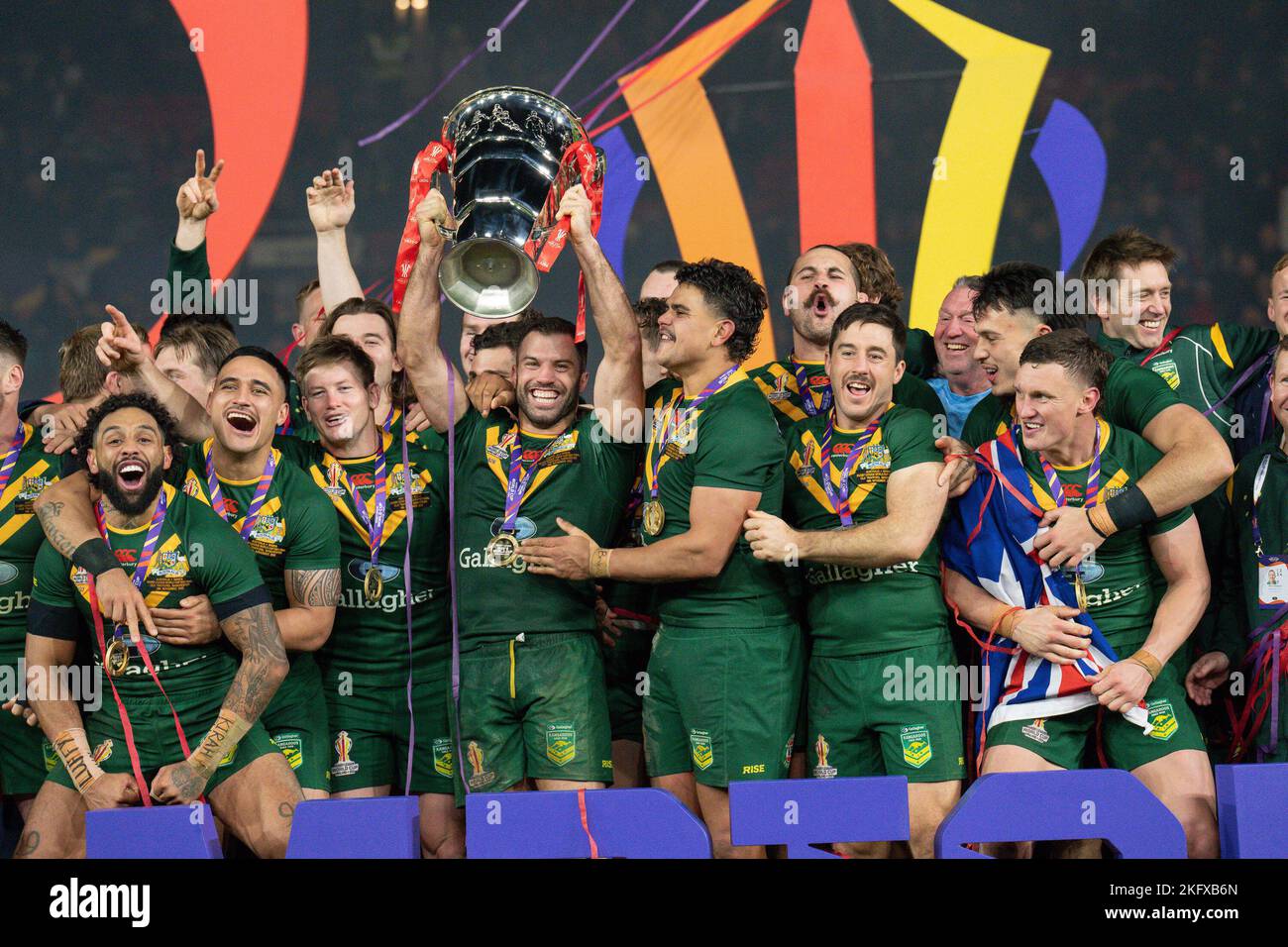 Manchester, UK. 18th Nov, 2022. James Tedesco (C) (Sydney Roosters) of Australia (1) lifts the trophy after winning the 2021 Rugby League World Cup Final 2021 match between Australia and Samoa at Old Trafford, Manchester, England on 19 November 2022. Photo by David Horn. Credit: PRiME Media Images/Alamy Live News Stock Photo