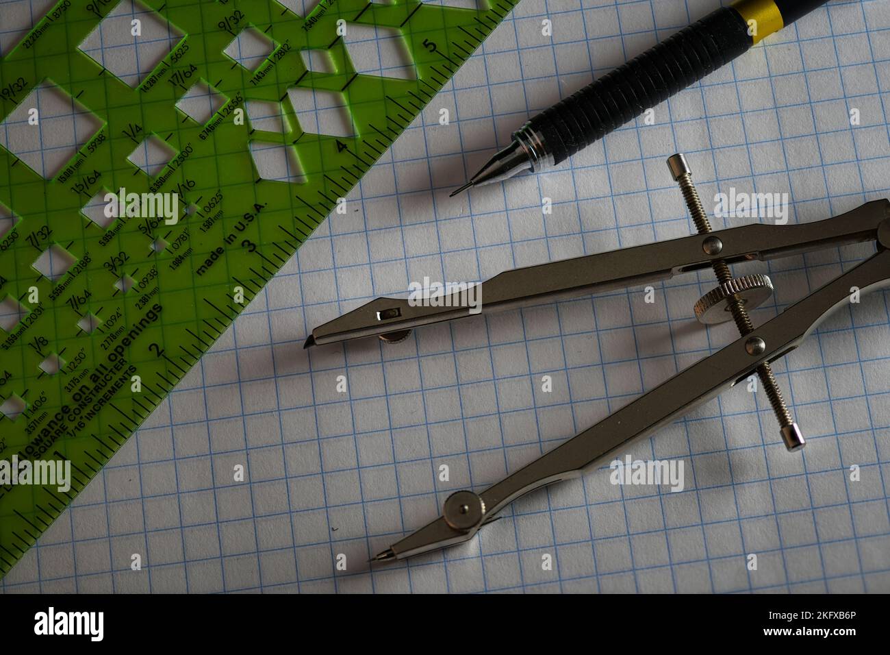 Drafting Tools on Grid Paper close up Stock Photo Alamy