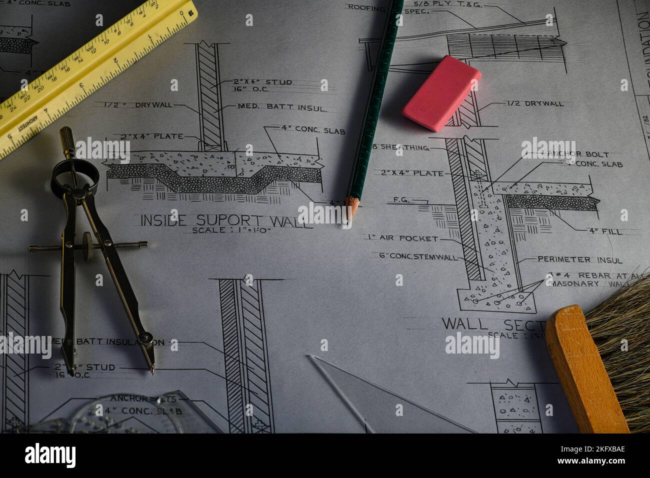 Drafting tools on hand drawn Architectural Plans Stock Photo