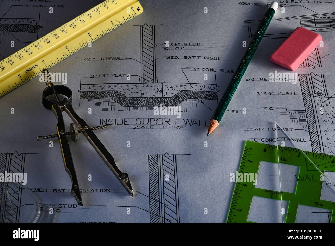 Drafting tools on hand drawn Architectural Plans Stock Photo