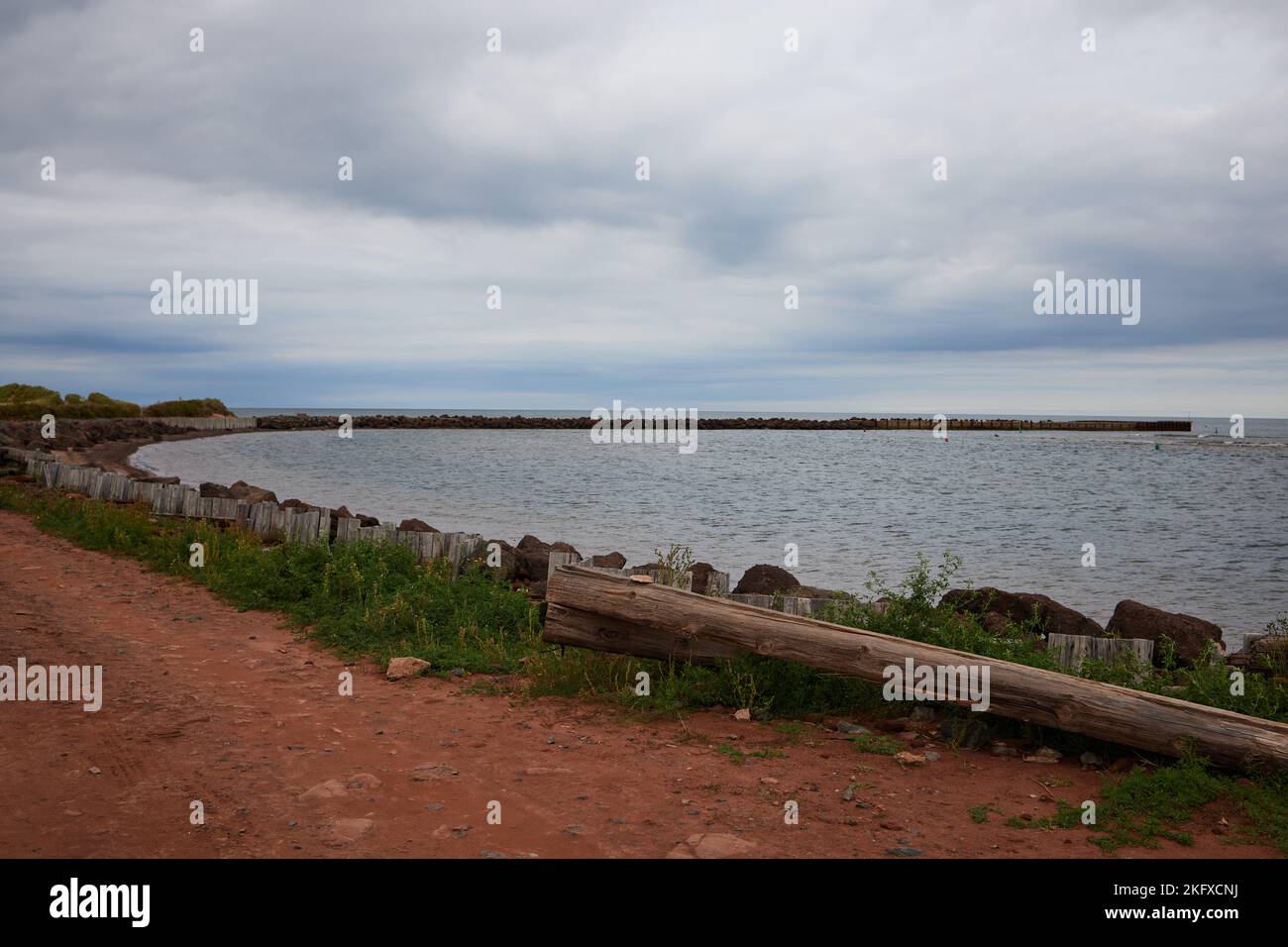 Rustico Bay Looking out at the Atlantic ocean from the red sandy shore in North ...