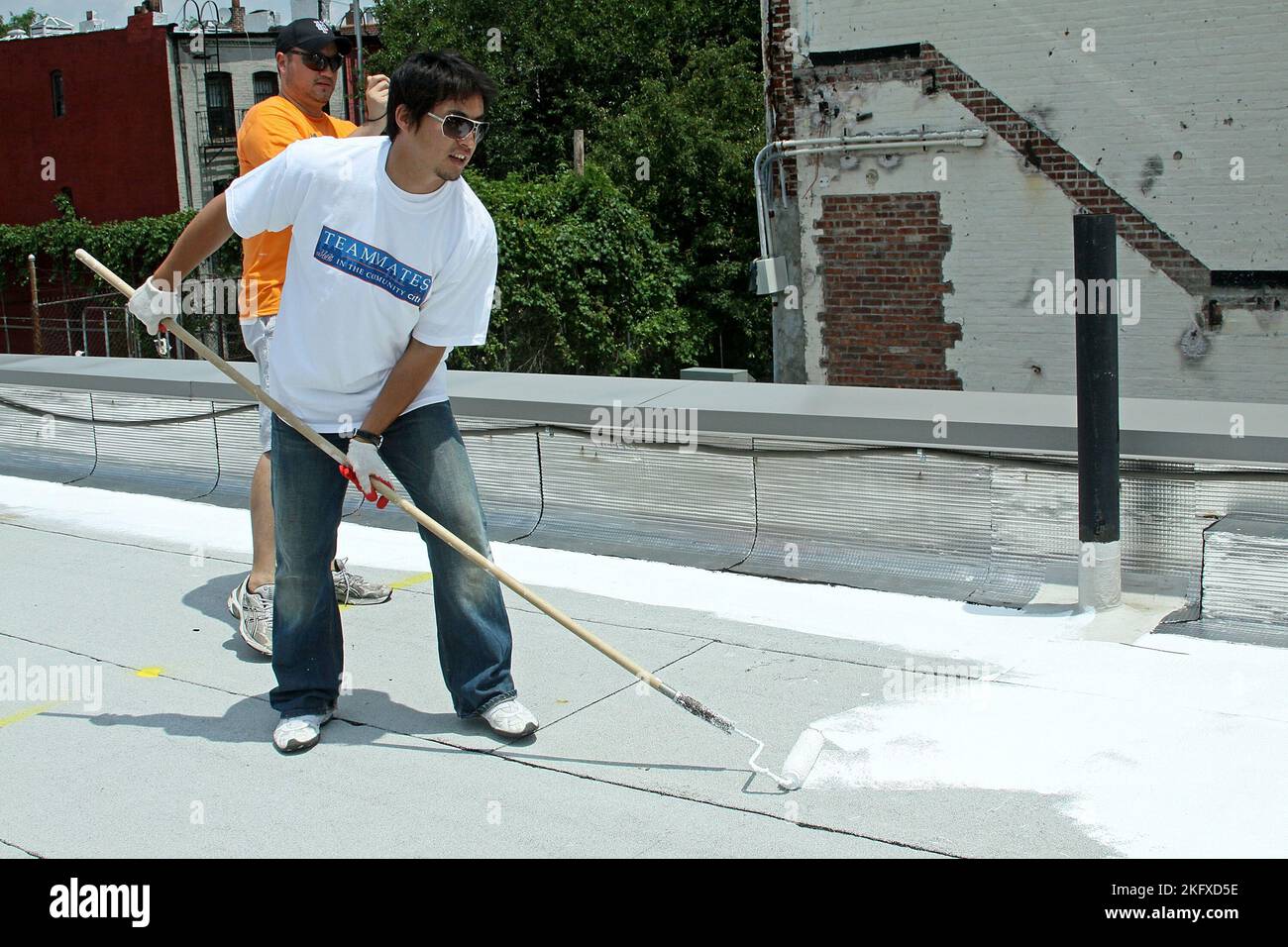 Brooklyn, NY, USA. 23 June, 2010. Hisanori Takahashi, of the NY Mets at the Cool The Roof Project at the Bedford-Stuyvesant YMCA. Credit: Steve Mack/Alamy Stock Photo