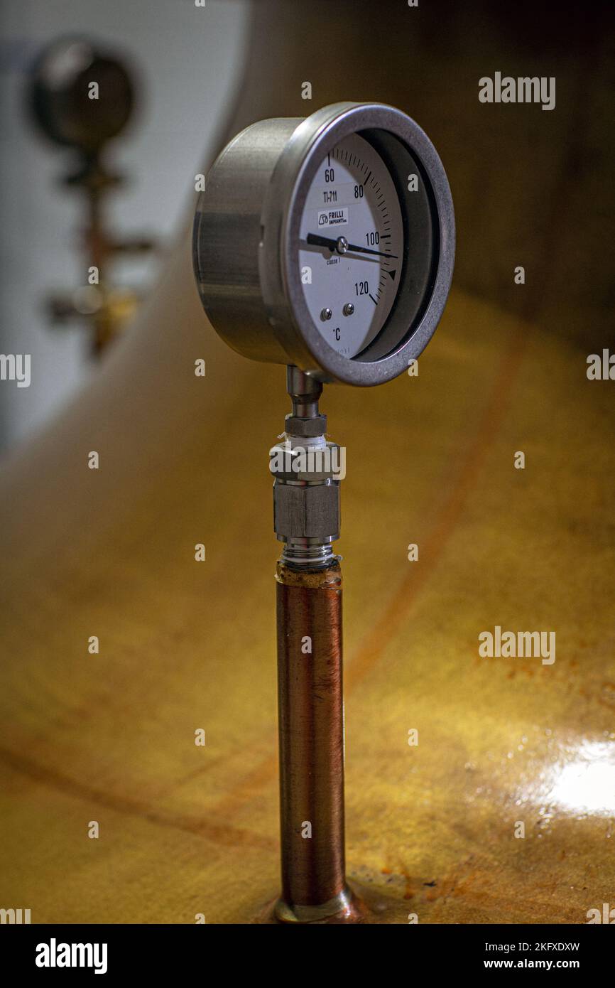Alcohol Temperature Gauge at Copper Still Distillery Brewery ,Isle of Harris Distillery, Scotland Stock Photo