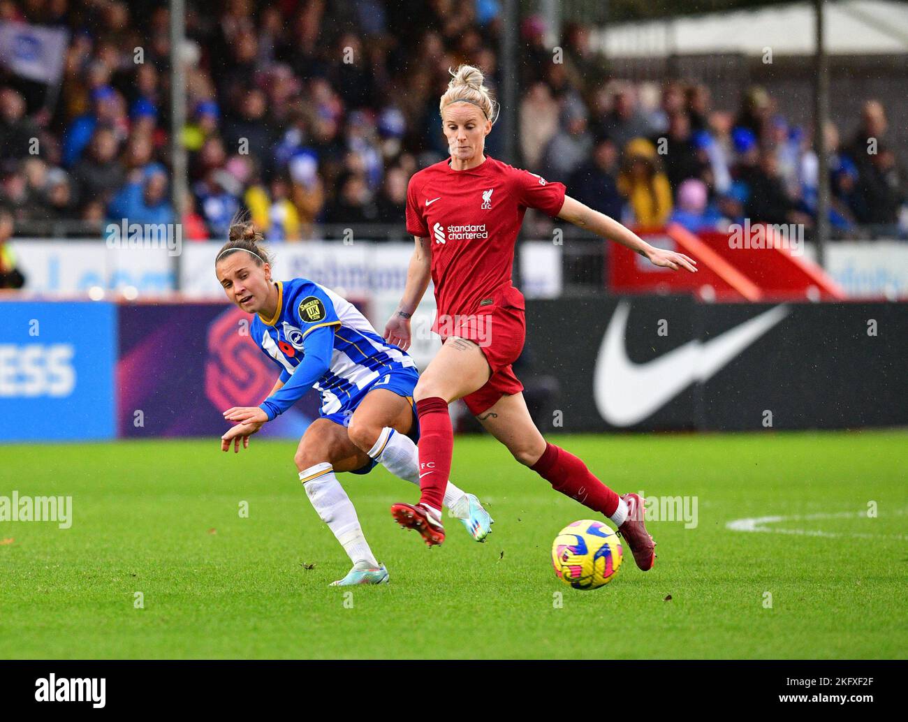 Crawley, UK. 20th Nov, 2022. Jasmine Matthews of Liverpool fouls Julia Zigiotti Olme of Brighton and Hove Albion resulting in a yellow card during the FA Women's Super League match between Brighton & Hove Albion Women and Liverpool Women at The People's Pension Stadium on November 20th 2022 in Crawley, United Kingdom. (Photo by Jeff Mood/phcimages.com) Credit: PHC Images/Alamy Live News Stock Photo