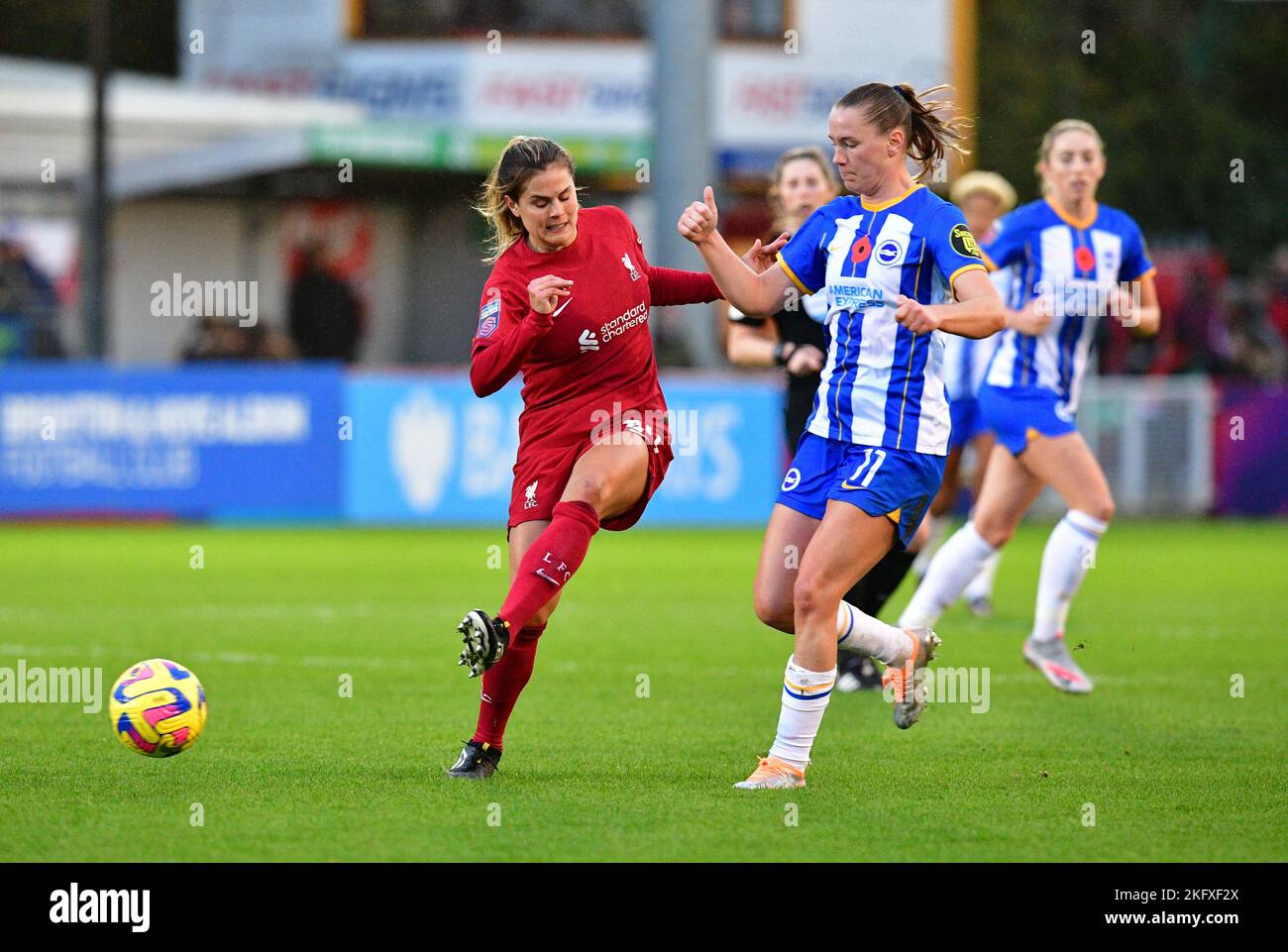 Crawley, UK. 20th Nov, 2022. Katie Stengel of Liverpool and Elisabeth Terland of Brighton and Hove Albion during the FA Women's Super League match between Brighton & Hove Albion Women and Liverpool Women at The People's Pension Stadium on November 20th 2022 in Crawley, United Kingdom. (Photo by Jeff Mood/phcimages.com) Credit: PHC Images/Alamy Live News Stock Photo