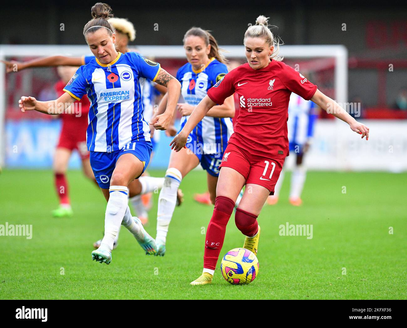 Crawley, UK. 20th Nov, 2022. Julia Zigiotti Olme of Brighton and Hove Albion and Melissa Lawley of Liverpool during the FA Women's Super League match between Brighton & Hove Albion Women and Liverpool Women at The People's Pension Stadium on November 20th 2022 in Crawley, United Kingdom. (Photo by Jeff Mood/phcimages.com) Credit: PHC Images/Alamy Live News Stock Photo