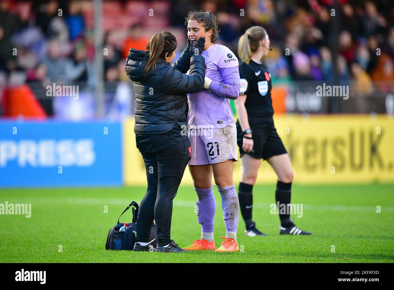 Crawley, UK. 20th Nov, 2022. Eartha Cumings Goalkeeper of Liverpool receives treatment following her collision with Elisabeth Terland of Brighton and Hove Albion during the FA Women's Super League match between Brighton & Hove Albion Women and Liverpool Women at The People's Pension Stadium on November 20th 2022 in Crawley, United Kingdom. (Photo by Jeff Mood/phcimages.com) Credit: PHC Images/Alamy Live News Stock Photo