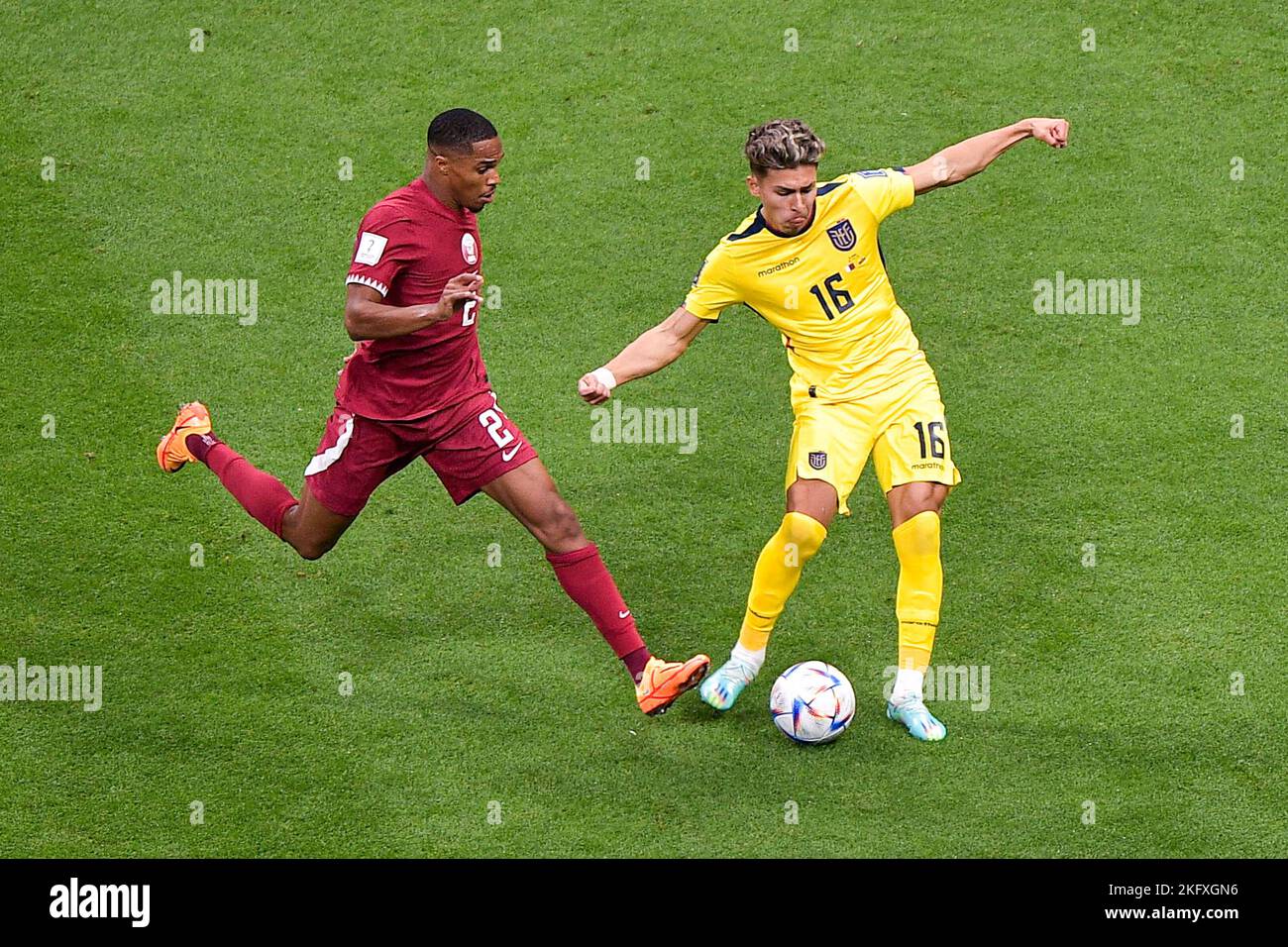 Al Khor, Qatar. 20th Nov, 2022. AL KHOR, QATAR - NOVEMBER 20: Pedro Miguel of Qatar battles for the ball with Jeremy Sarmiento of Ecuador during the Group A - FIFA World Cup Qatar 2022 match between Qatar and Ecuador at Al Bayt Stadium on November 20, 2022 in Al Khor, Qatar (Photo by Pablo Morano/BSR Agency) Credit: BSR Agency/Alamy Live News Stock Photo