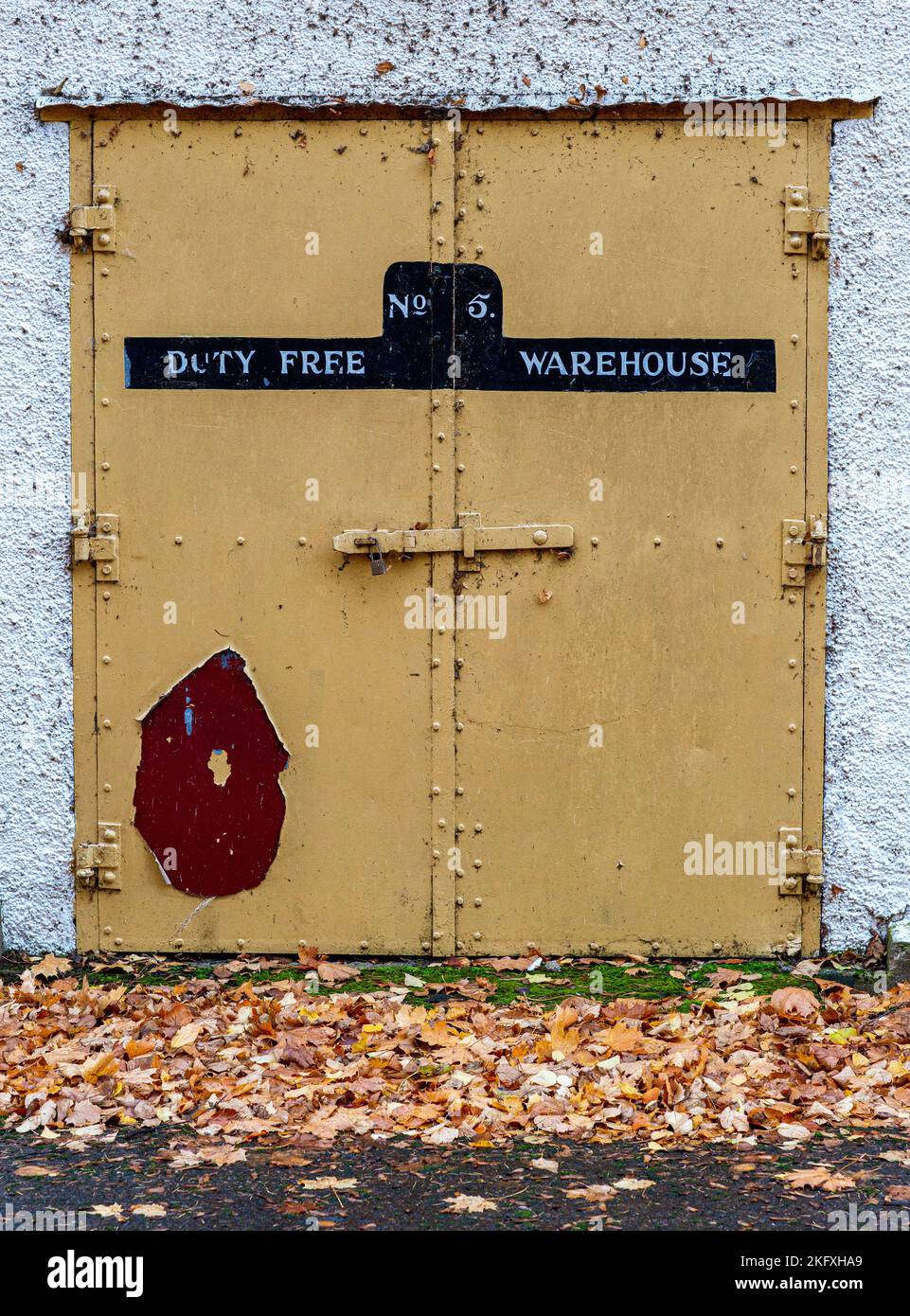 Strathisla distillery no 5 warehouse  in Speyside, Dufftown, United Kingdom. Door entrance to Bonded warehouse No 5 Stock Photo