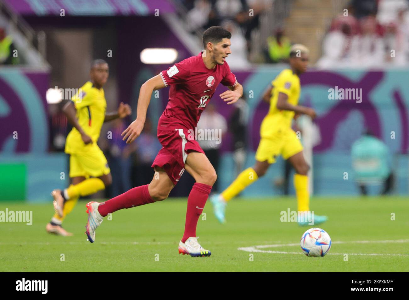 Al Khor, Qatar. 20th Nov, 2022. Karim Boudiaf of Qatar dribbles the ball during the FIFA World Cup Qatar 2022 Group A match between Qatar and Ecuador at Al Bayt Stadium, Al Khor, Qatar on 20 November 2022. Photo by Peter Dovgan. Editorial use only, license required for commercial use. No use in betting, games or a single club/league/player publications. Credit: UK Sports Pics Ltd/Alamy Live News Stock Photo