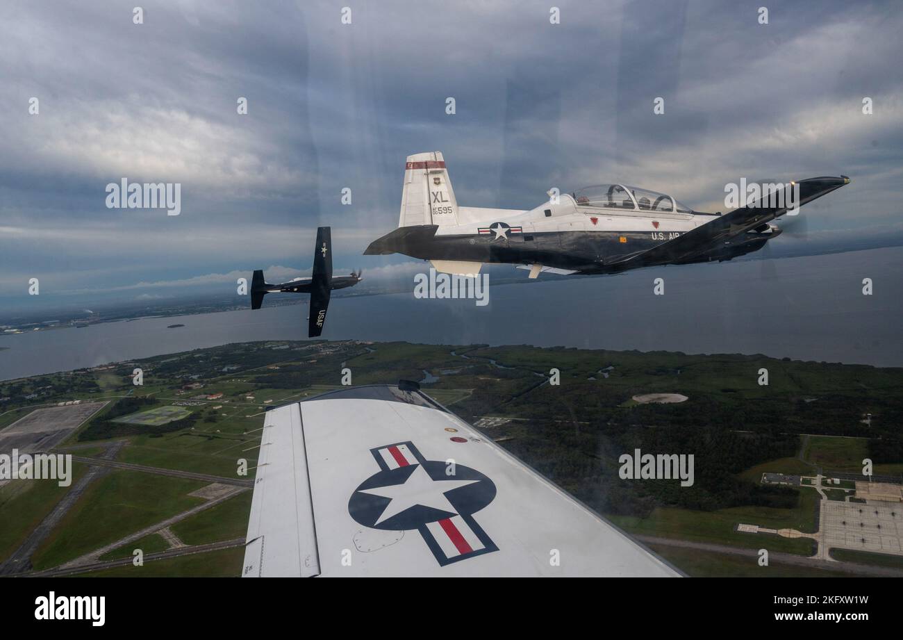A flight of T6 Texan II's turn to land at MacDill Air Force Base
