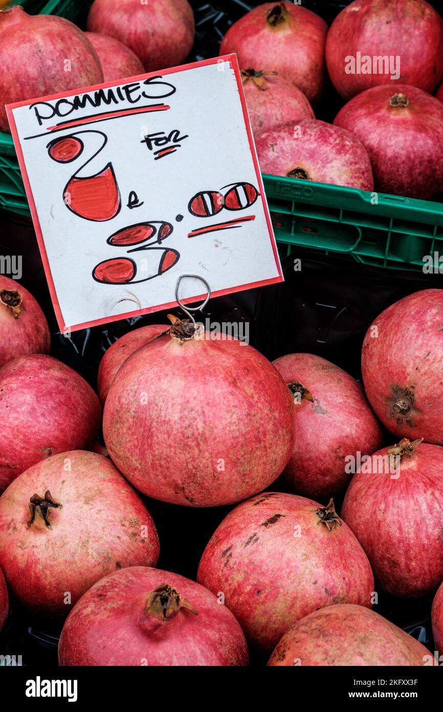 Epsom, Surrey, London UK, November 19 2022, Display Of Whole Healthy Pomegranate On A Market Stall With No People Stock Photo