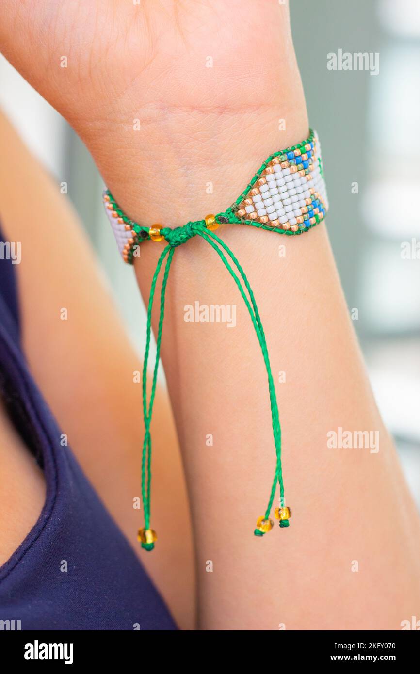 Friendship bracelet thread hi-res stock photography and images