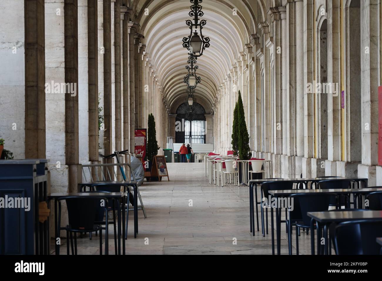 Lisbon, Portugal - September 2022: Passageway of The Supreme Court in Lisbon (Supremo Tribunal de Justica), with arches forming a vanishing point in a Stock Photo
