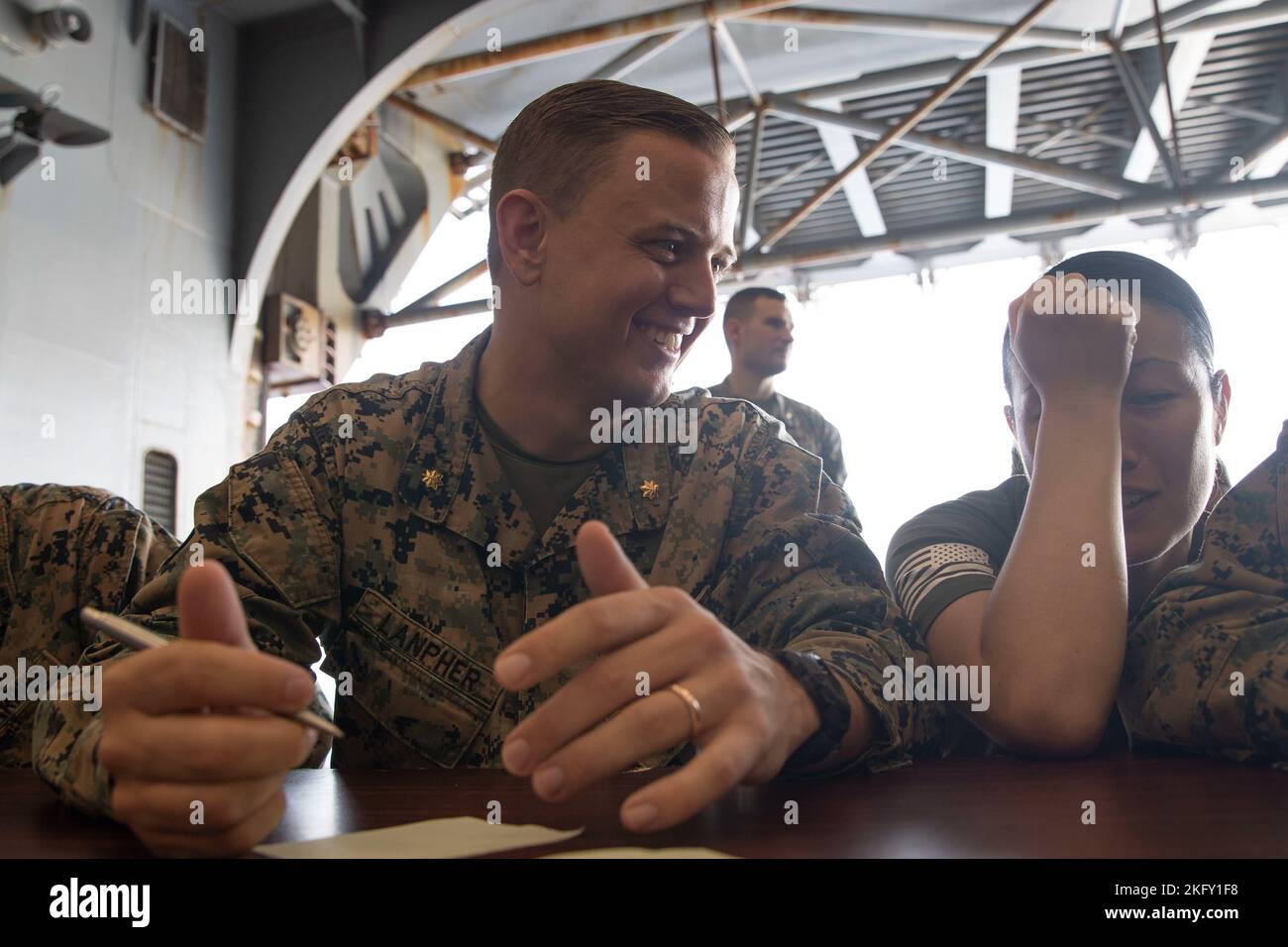 Lt. Sean Kugler, is welcomed by his family, Stephen, 7, Shianne, 3, and his  wife, Melissa, after the USS John C. Stennis, a 1,092-foot-long aircraft  carrier pulled into its home port on