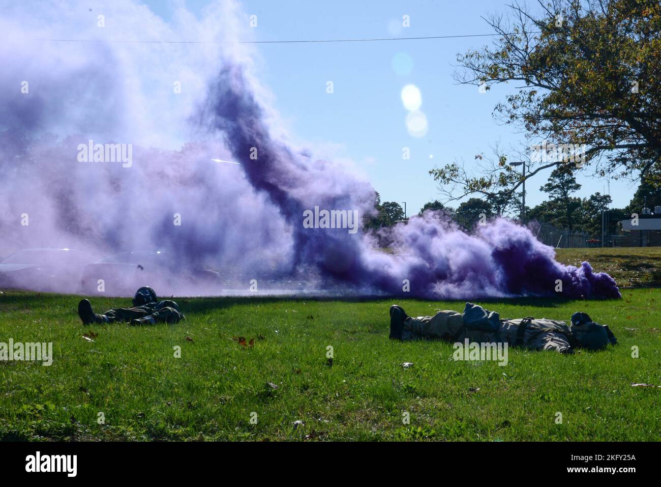 An exercise post attack reconnaissance team simulates casualties while ...