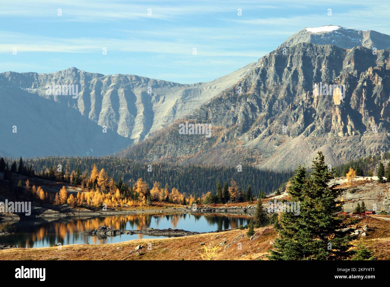 Mountains reflected in Rock Isle Lake, Sunshine Meadows, Mount