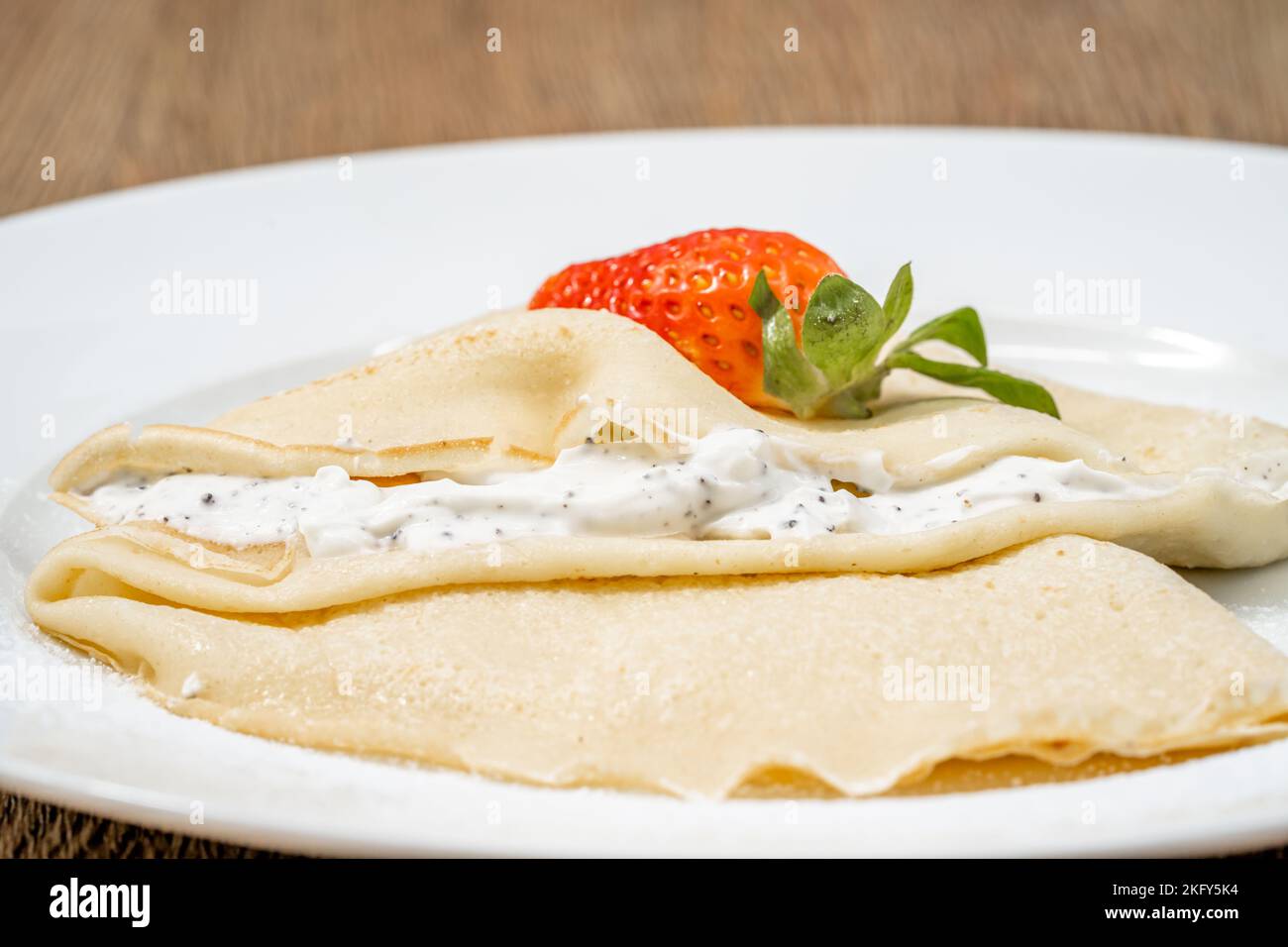 pancake with cream and strawberry Stock Photo