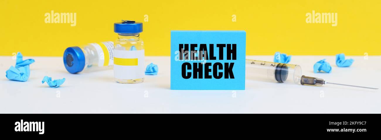 Medicine and health concept. On the table is a syringe, injections and ...