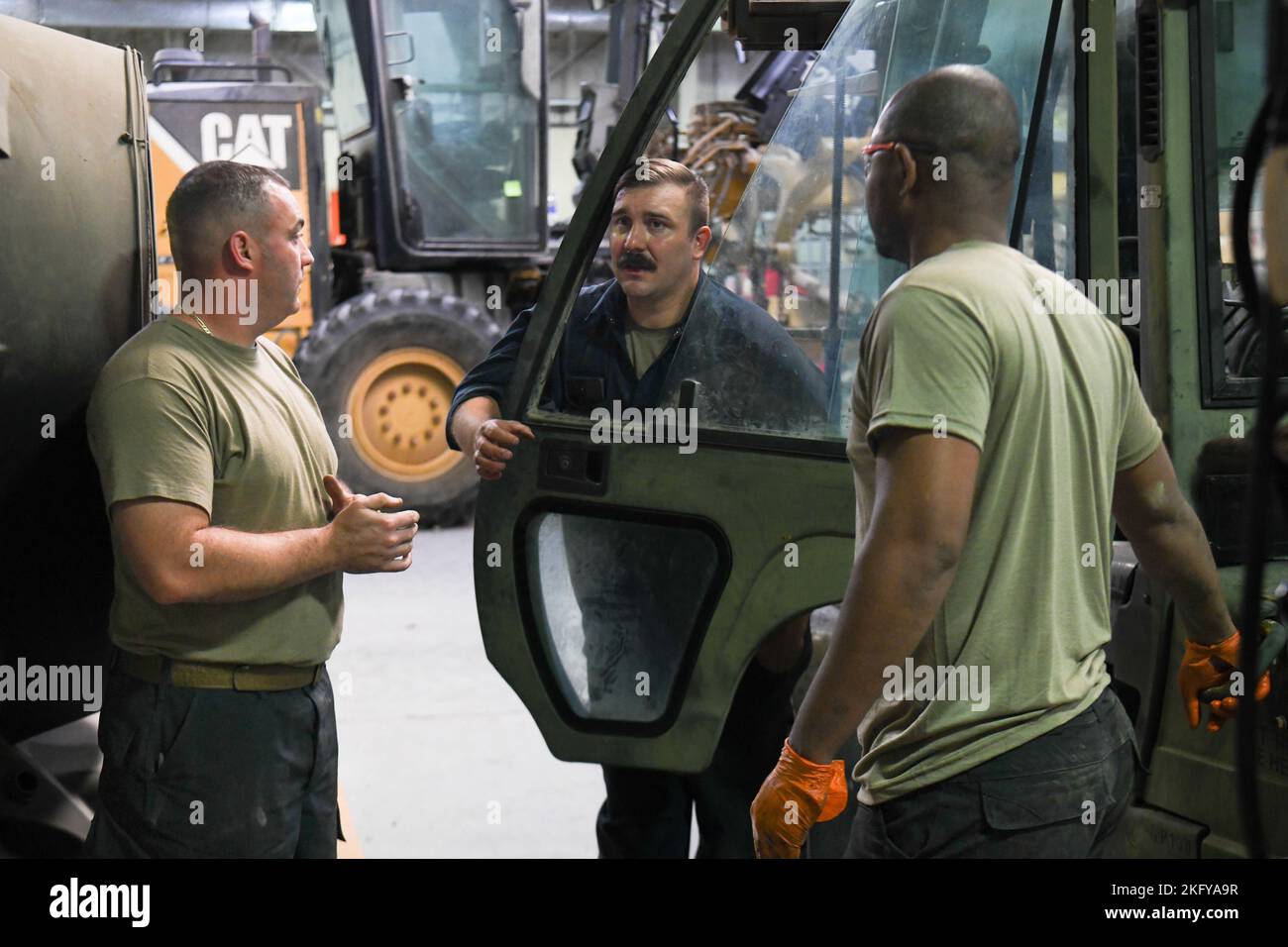 (From left) Staff. Sgt. Frank Herring, Staff Sgt. Kyle Nauman, and