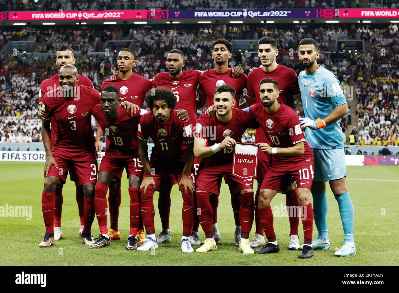 AL KHOR - Above (lr) Boualem Khoukhi of Qatar, Pedro Miguel of Qatar, Abdulaziz Hatem of Qatar, Homam Elamin of Qatar, Karim Boudiaf of Qatar, Qatar goalkeeper Saad Al Sheeb. Below (l-r) Abdelkarim Hasan Fadlalla of Qatar, Almoez Ali of Qatar, Akram Afif of Qatar, Bassam Al-Rawi of Qatar, Hassan Al Haidos of Qatar during the FIFA World Cup Qatar 2022 group A match between Qatar and Ecuador at the Al Bayt Stadium on November 20, 2022 in Al Khor, Qatar. AP | Dutch Height | MAURICE OF STONE Stock Photo