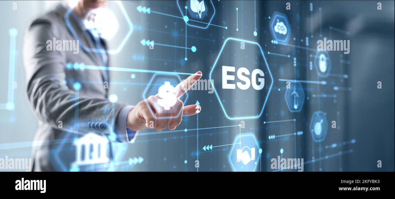 Businessman clicks ESG Environmental Social Governance sustainable development and investment. Stock Photo