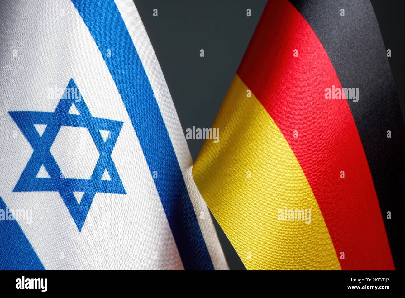Flags of Germany and Israel as a symbol of diplomatic relations. Stock Photo
