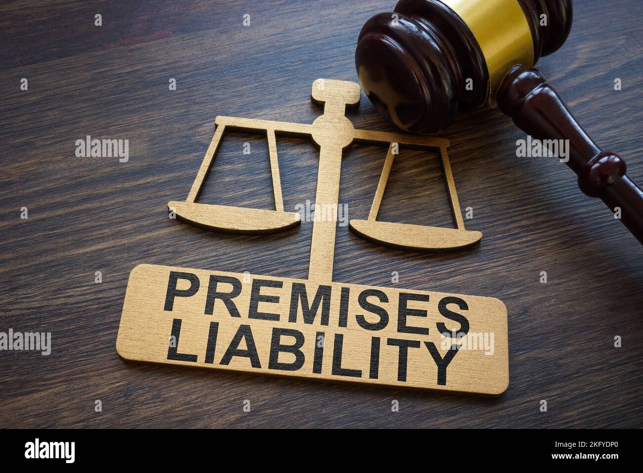 Plate with inscription Premises liability and gavel. Stock Photo