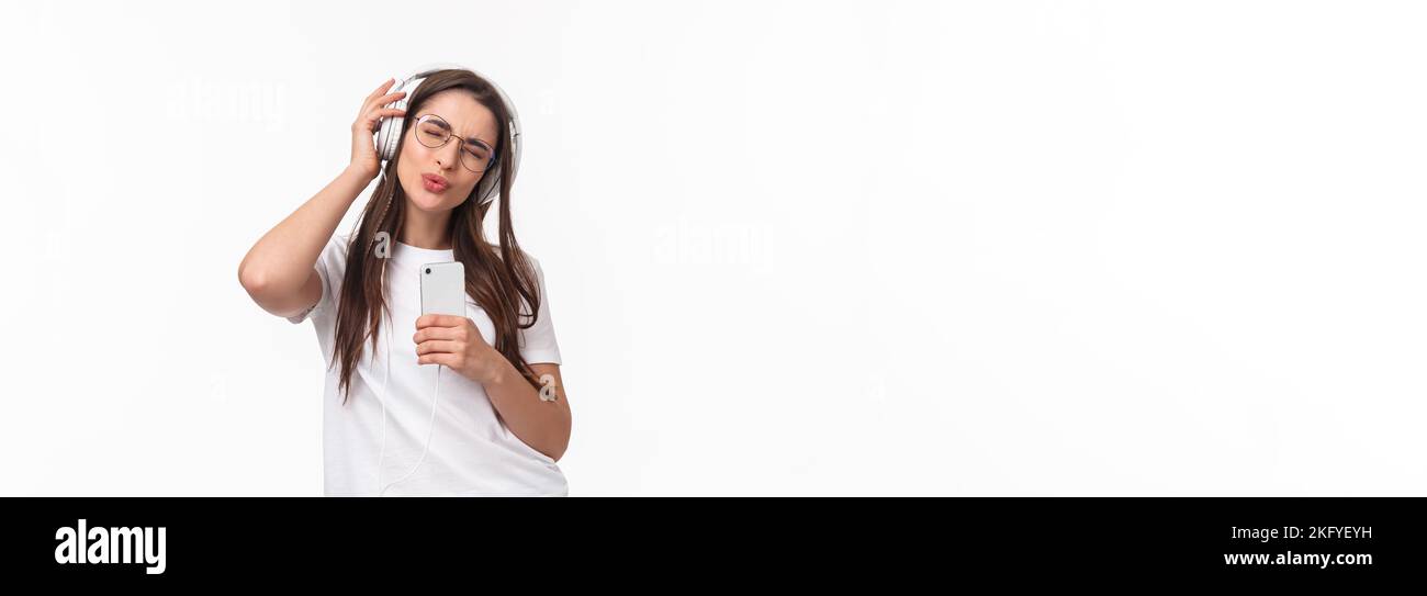 Technology, lifestyle and music concept. Portrait of upbeat