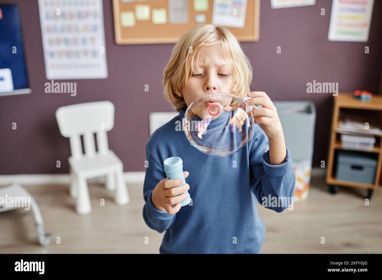 Child blow bubble classroom hires stock photography and images Alamy