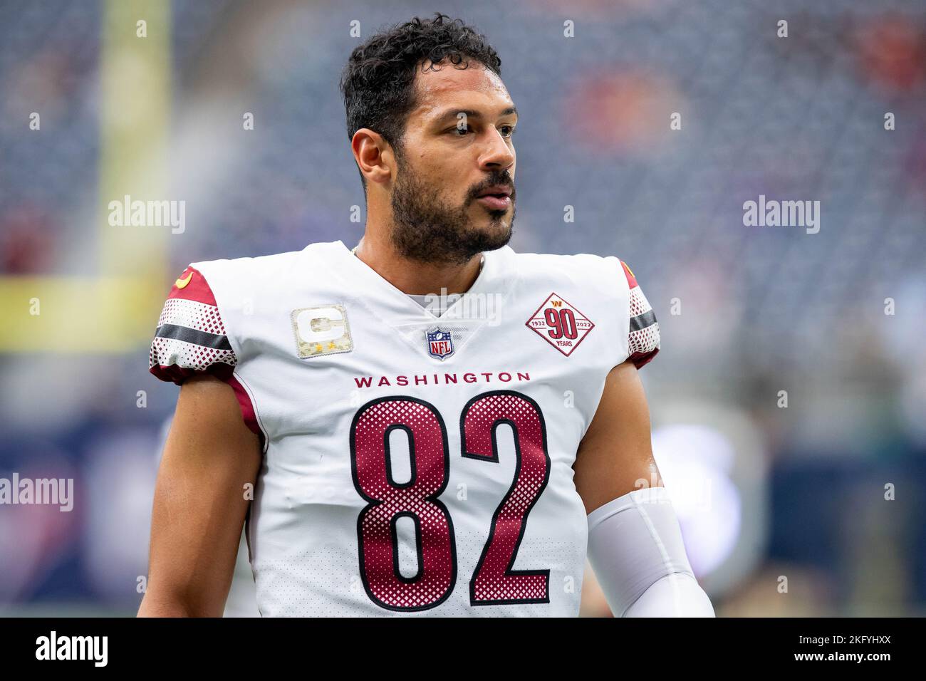 Washington Commanders tight end Logan Thomas (82) warms up before