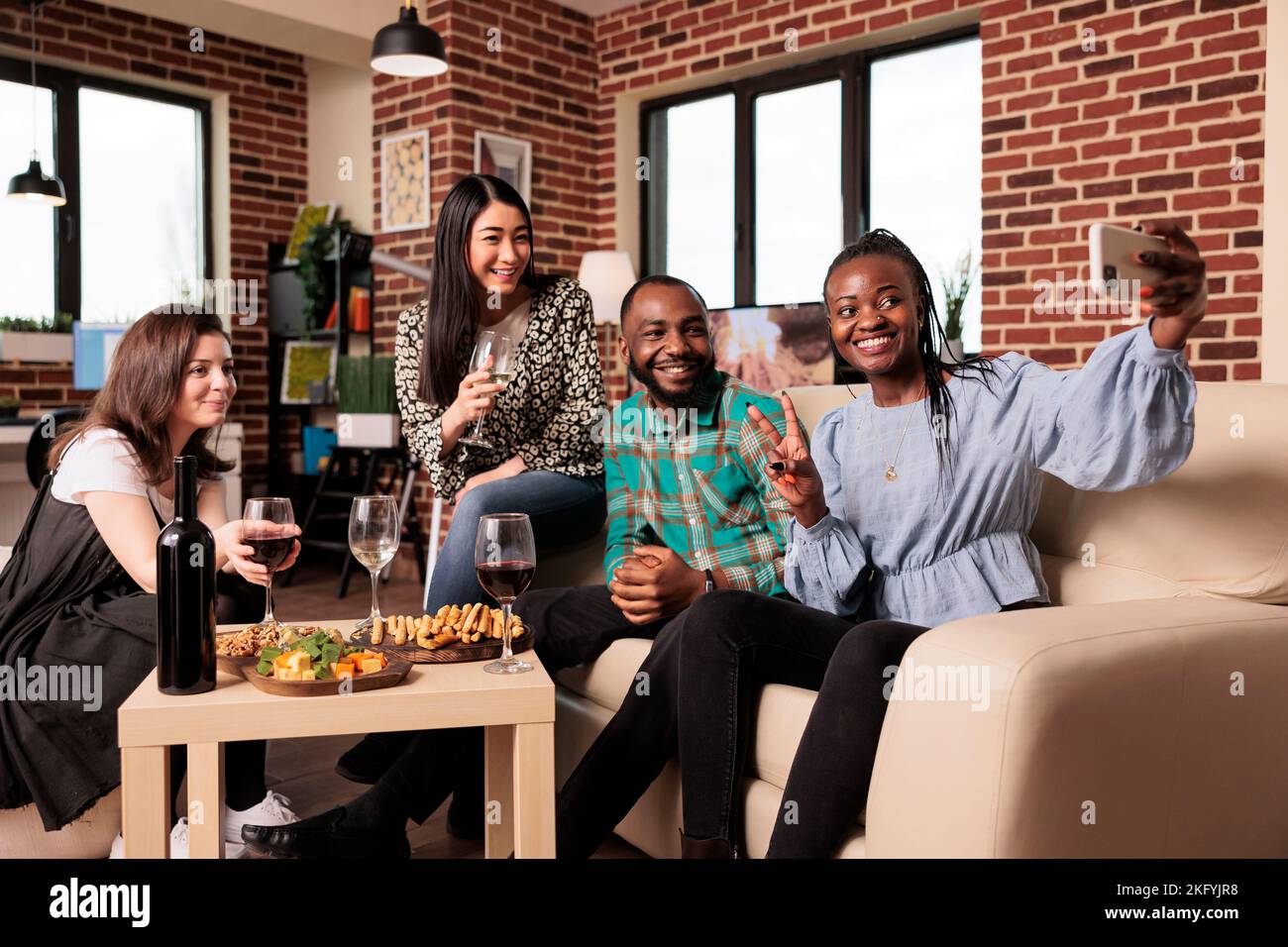 Photo inspiration: Picture Idea: African American Adult Woman Taking Cell Phone Picture With Asian