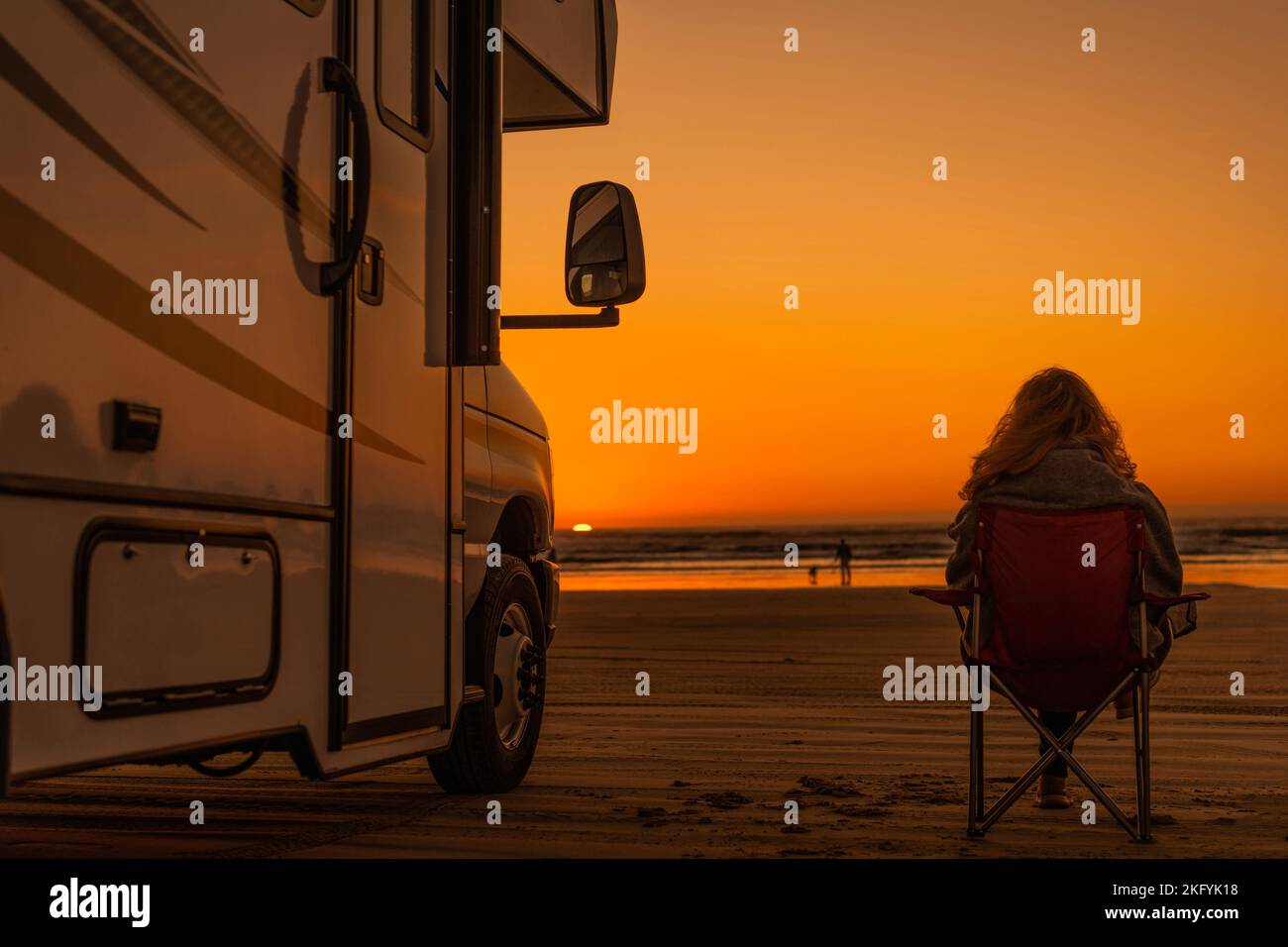 Man watching woman on beach hi-res stock photography and images - Alamy
