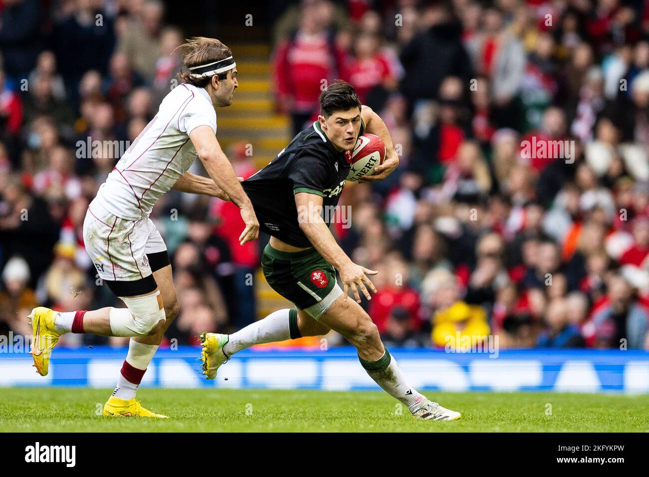 Louis Rees-Zammit of Wales is tackled by Mirian Modebadze of Georgia ...