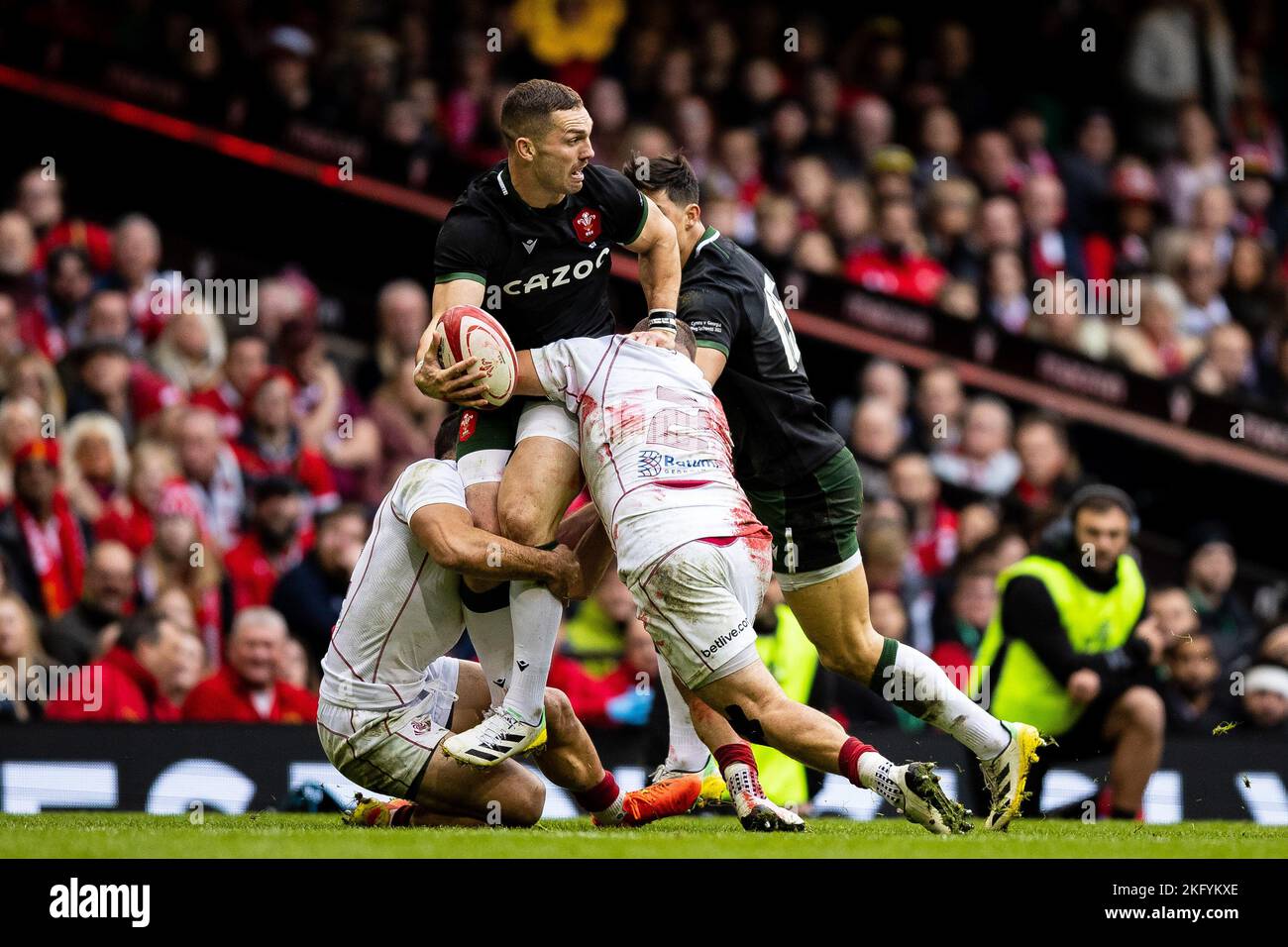 George North of Wales is tackled by Giorgi Chkoidze of Georgia during ...