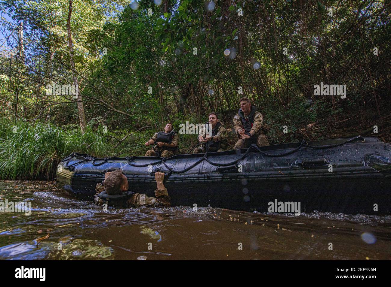 One Rope Bridge With Ruck U.S. Army Soldiers participating in Jungle School perform waterborne ...